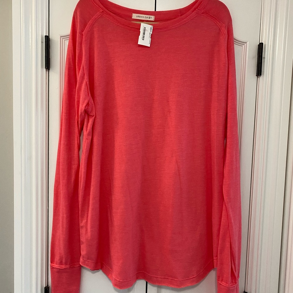 NWT! Coral colored raw edge long sleeve top